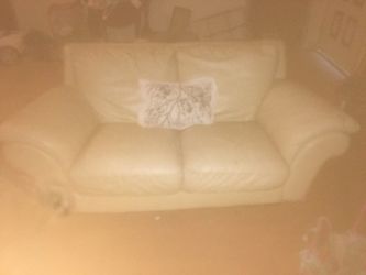 White leather love seat