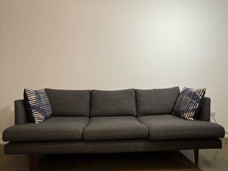 Gray three seater sofa