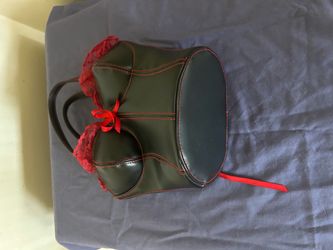 Black Leather Corset-Style Handbag with Red Lace