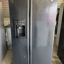 Black GE Refrigerator And Freezer