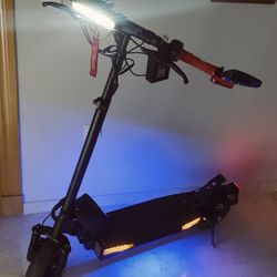 Clean Electric Scooter with LED Lights – Strong Battery, Buy & Ride!