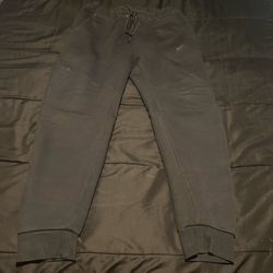 grey and black nike tech sweats