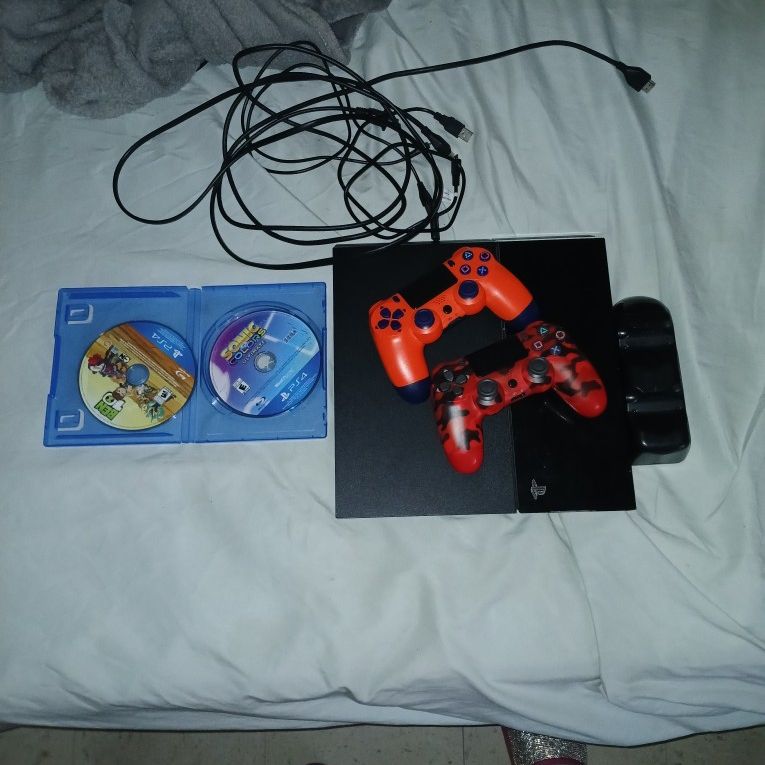 PS4 With 2 Controllers, 2 Games AN Other Acc.