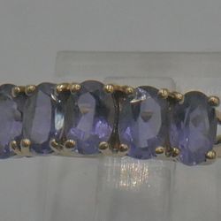 10kt yellow gold ring size 7 2.5 grams w 5 oval amethyst stones. 882920-2 .