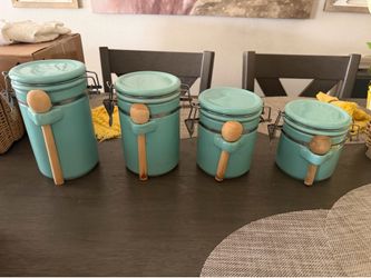 4 piece set of teal canisters