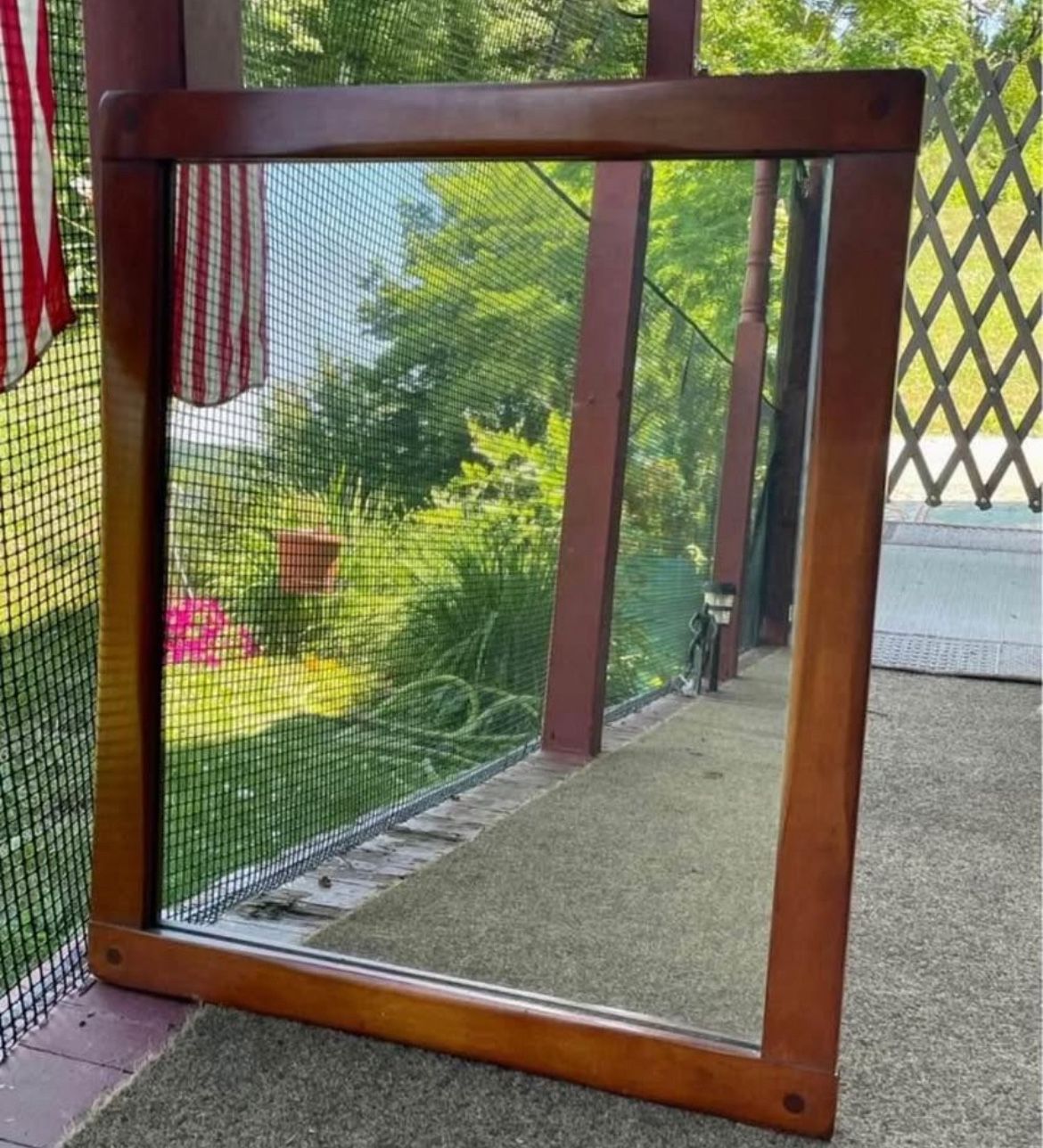Mid - century heavy maple mirror. Made by “Famous Reproductions of Old New England Furniture “