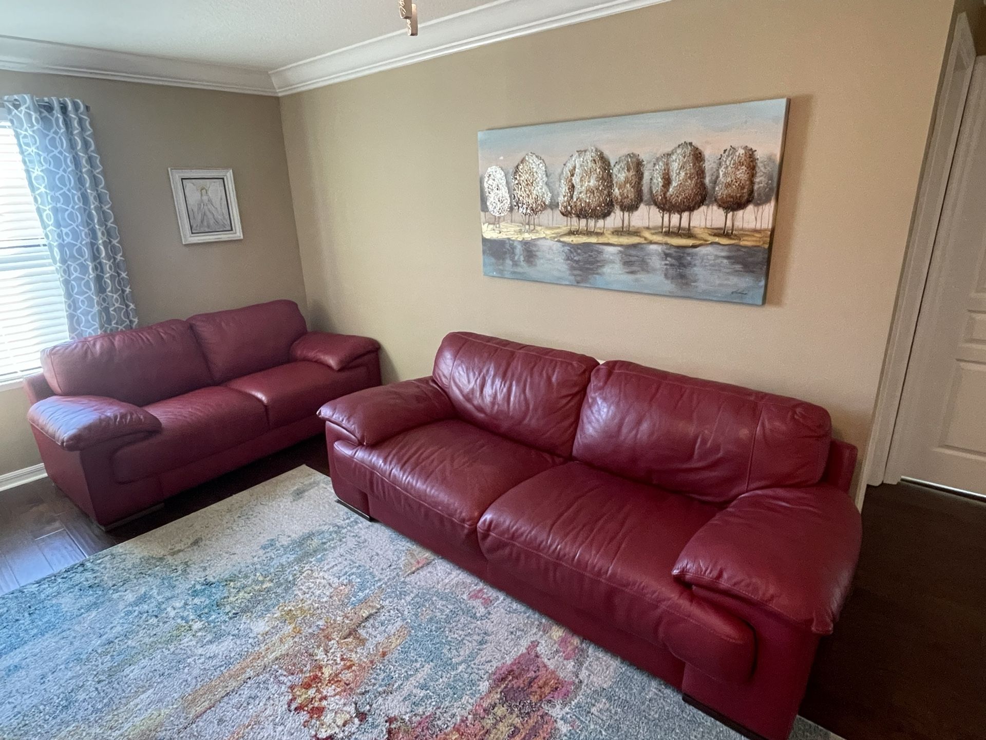 Red Leather Sofas $250. Each