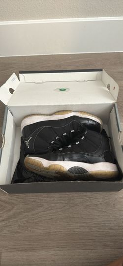 Air Jordan 11 retros black and multicolor size 5Y
