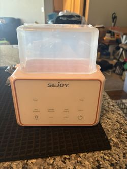 Pink Bottle Warmer