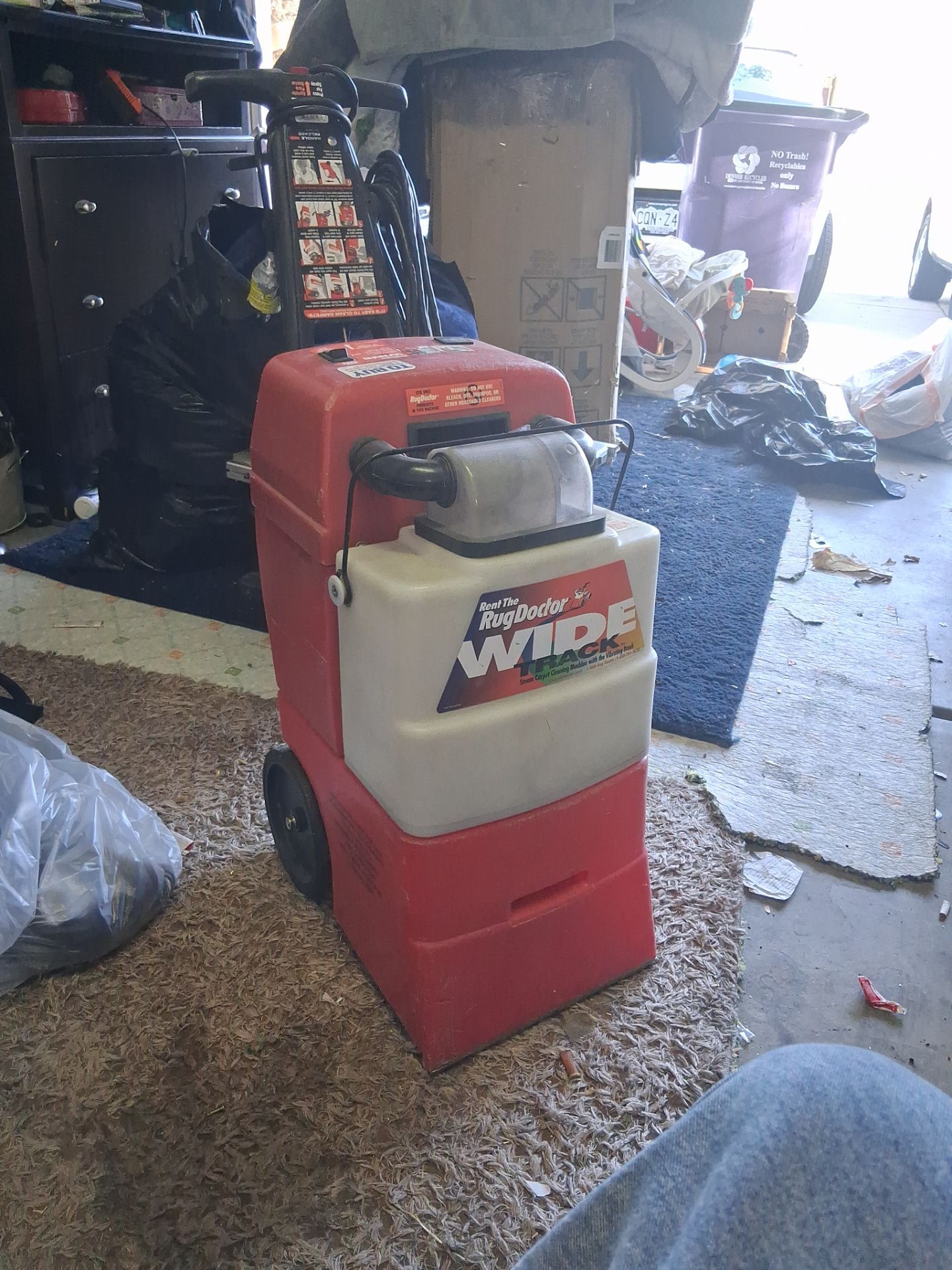 Old rug doctor needs a little love still vacuums well buy as is for scrap