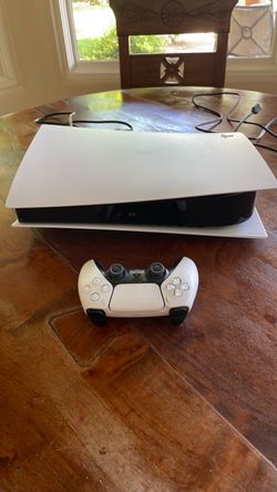 PlayStation 5 with controller