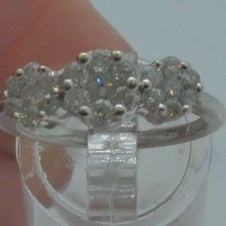 14kt white gold ring with 0.75 carat of  round diamonds; 3.7 grams; size 7.5 mint condition. 851424-1.