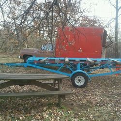 Storage tank transport trailer