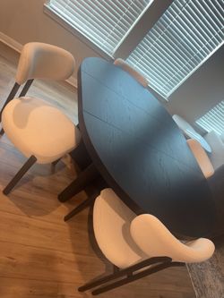 Black dining table with 4 chairs
