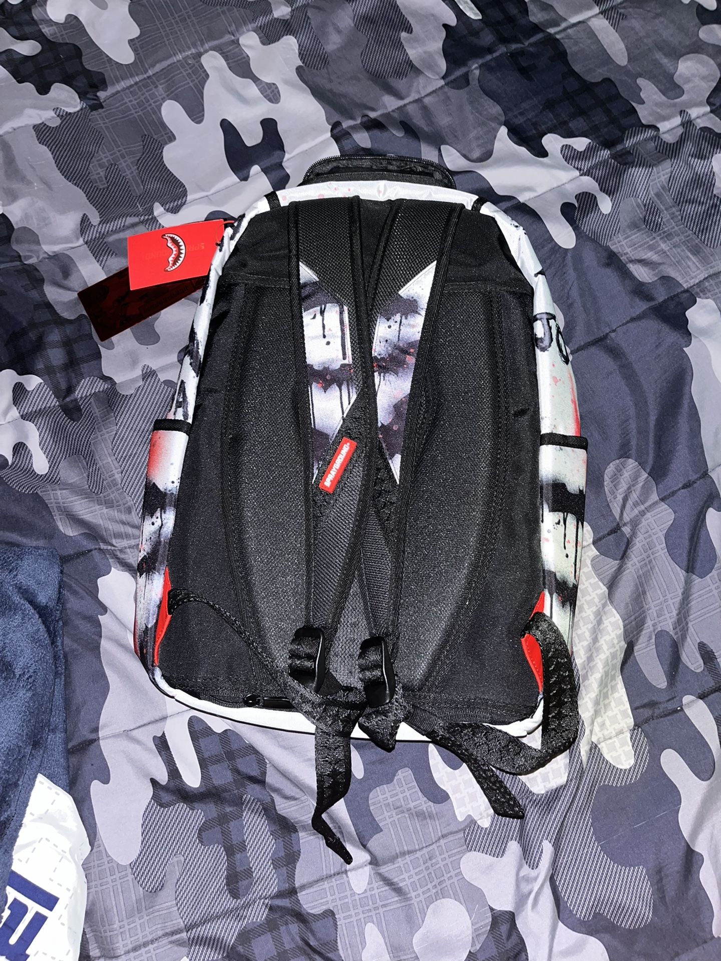 Spray-ground backpack