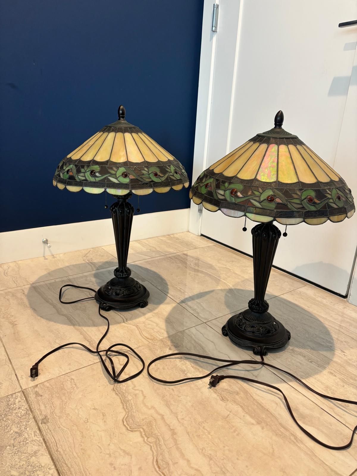 Vintage Stained glass lamps with bronze heavy bottom.18 “ wide x 25” high . $500