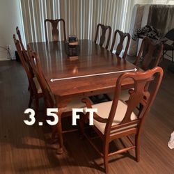 Dining table set with eight chairs