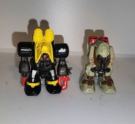 Androidz Roller Robot figures.... 1 missing arms