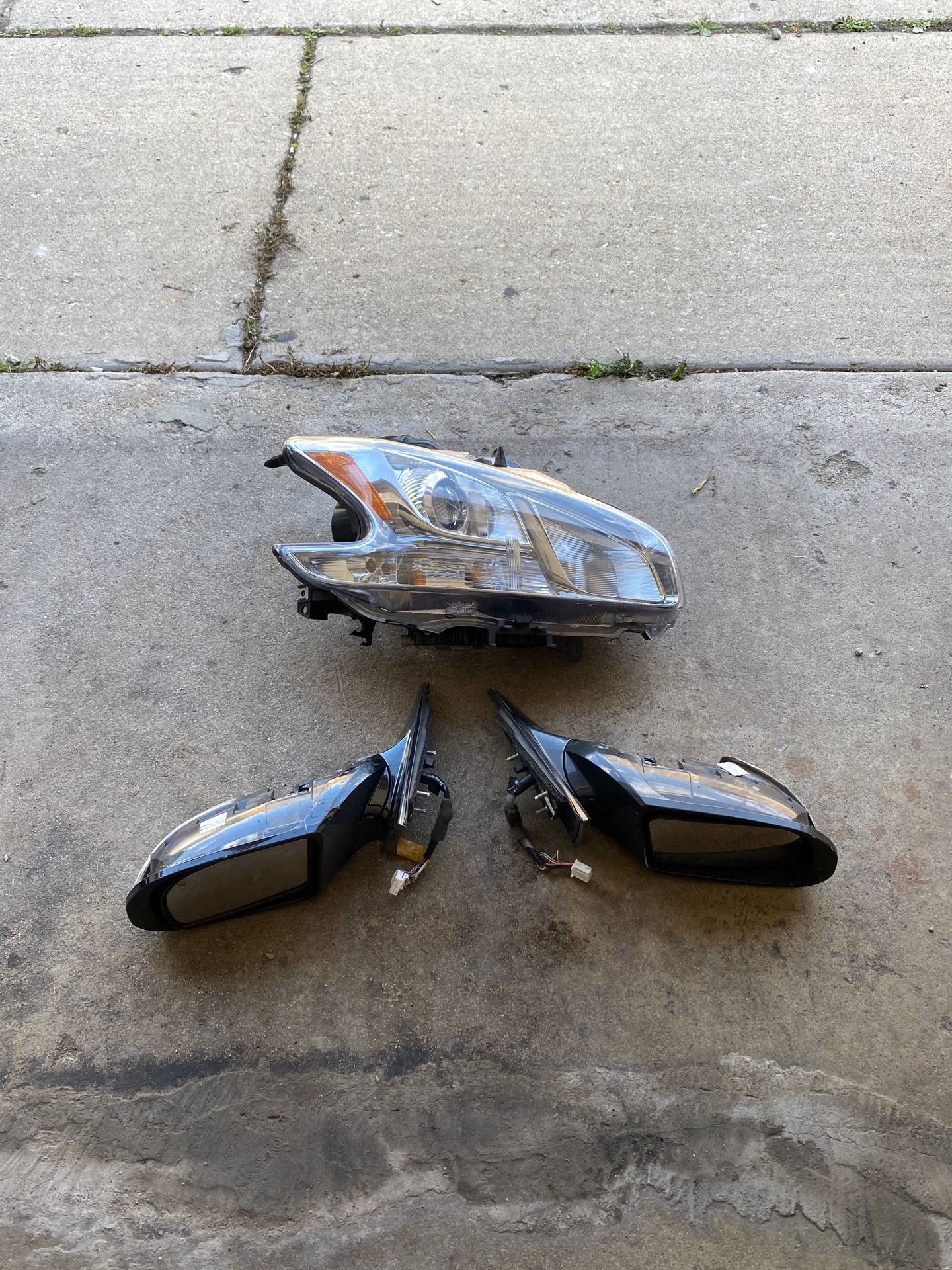 Nissan Maxima headlight and side mirrors