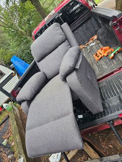 Spinner recliner chair. Yes there is animal hair and scratches on it. Still works could use a cover. Make offer
