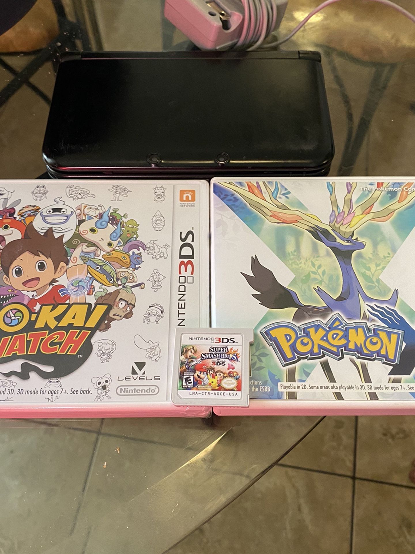 black Nintendo 3DS XL With Pokémon And Games