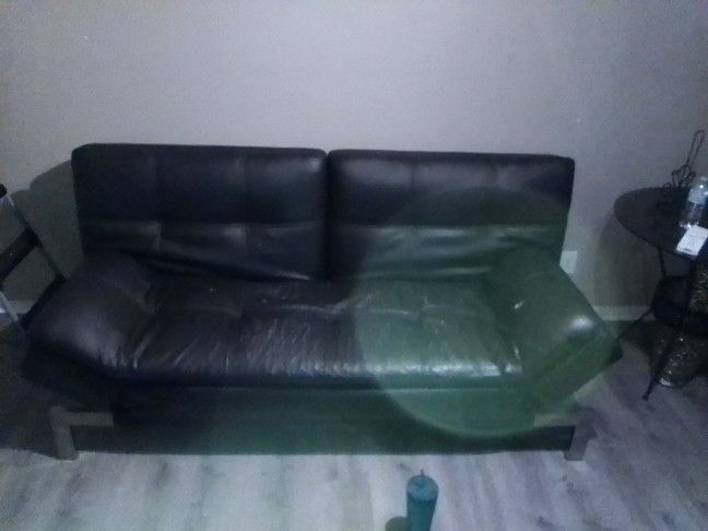 Black Leather Futon (Couch & Bed) with USB & Plug Outlets.