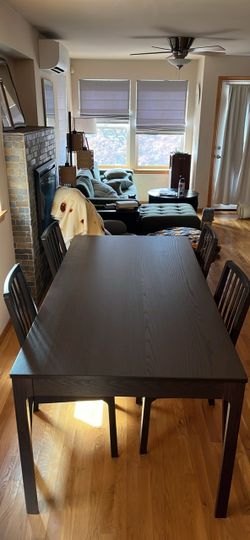 NÄSINGE Extendable table with four chairs