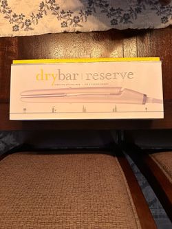 Dry bar reserve vibrating flat iron