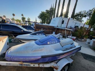 2 WAVE RUNNERS WITH TRAILER