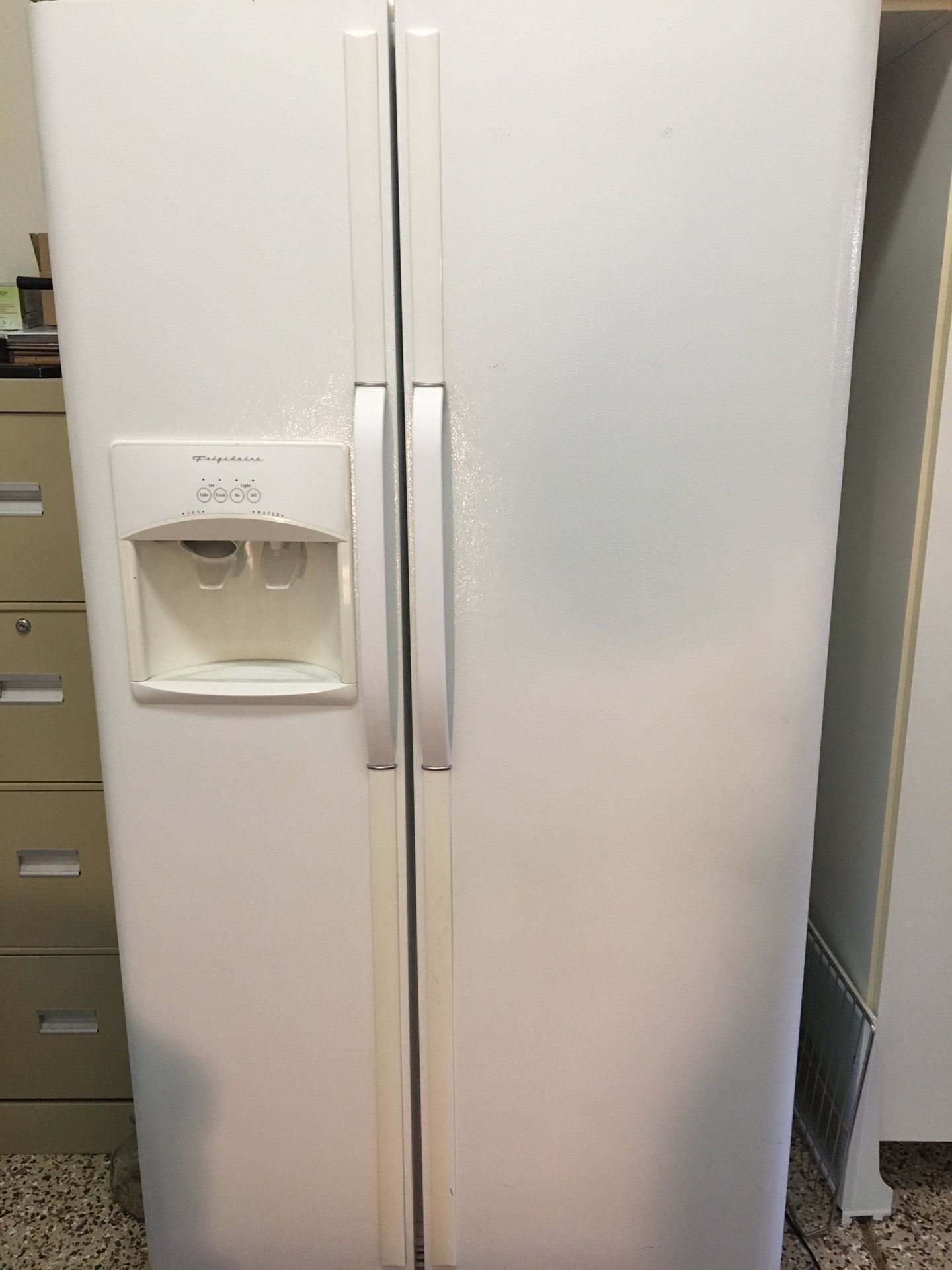 Side by side Frigidaire refrigerator
