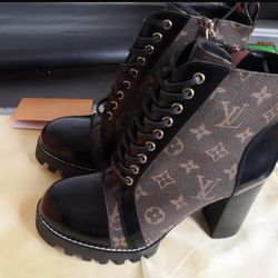 Brown Louis Vuitton ankle boots. Size 9. But Will Fit A Size 8 Comfortably , EUR 40. First Come First Serve.  $550.00
