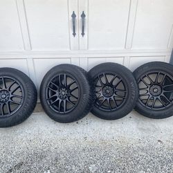 Dean Wintercat studded tires with Raceline tuning black rims