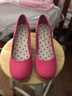 Pink high heel shoes