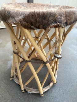 Rustic Rattan Stool with Cowhide Seat