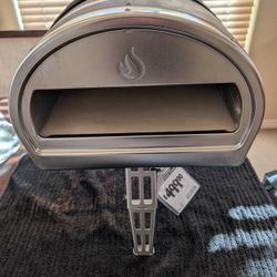 New Gozney Roccbox Wood fired pizza oven , oven never used