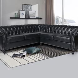 Faraaz Upholstered Faux Leather Chesterfield Sectional 