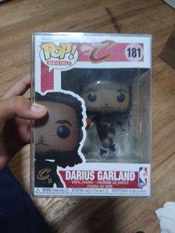 Darius garland funko pop in a protected case