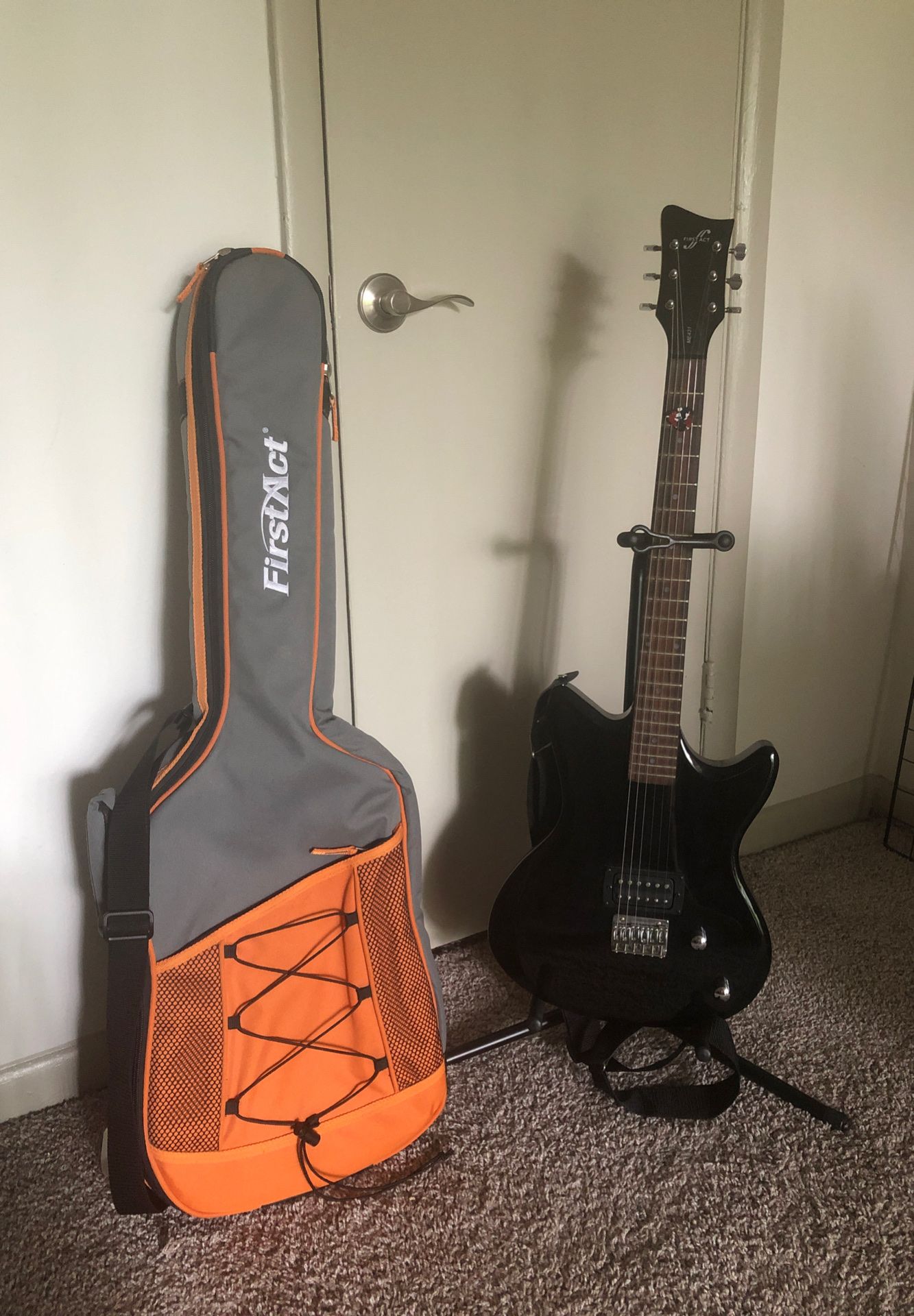 Guitar, Stand, and Case