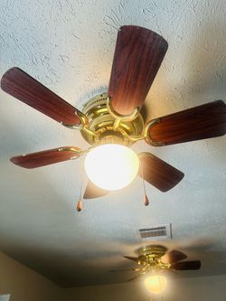 Two small ceiling fans Two small ceiling fans