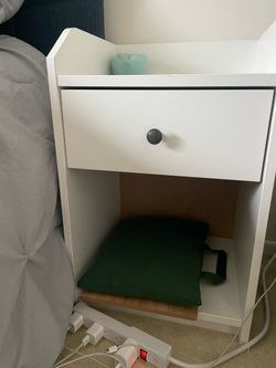 2 white side tables