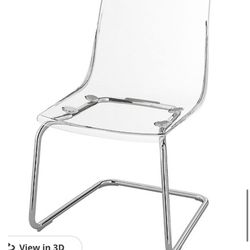 4 ps chairs identical to the ones in the photo.