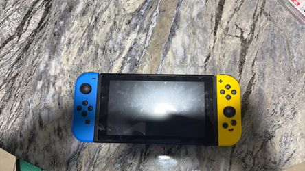Switch 1 with a case and two games