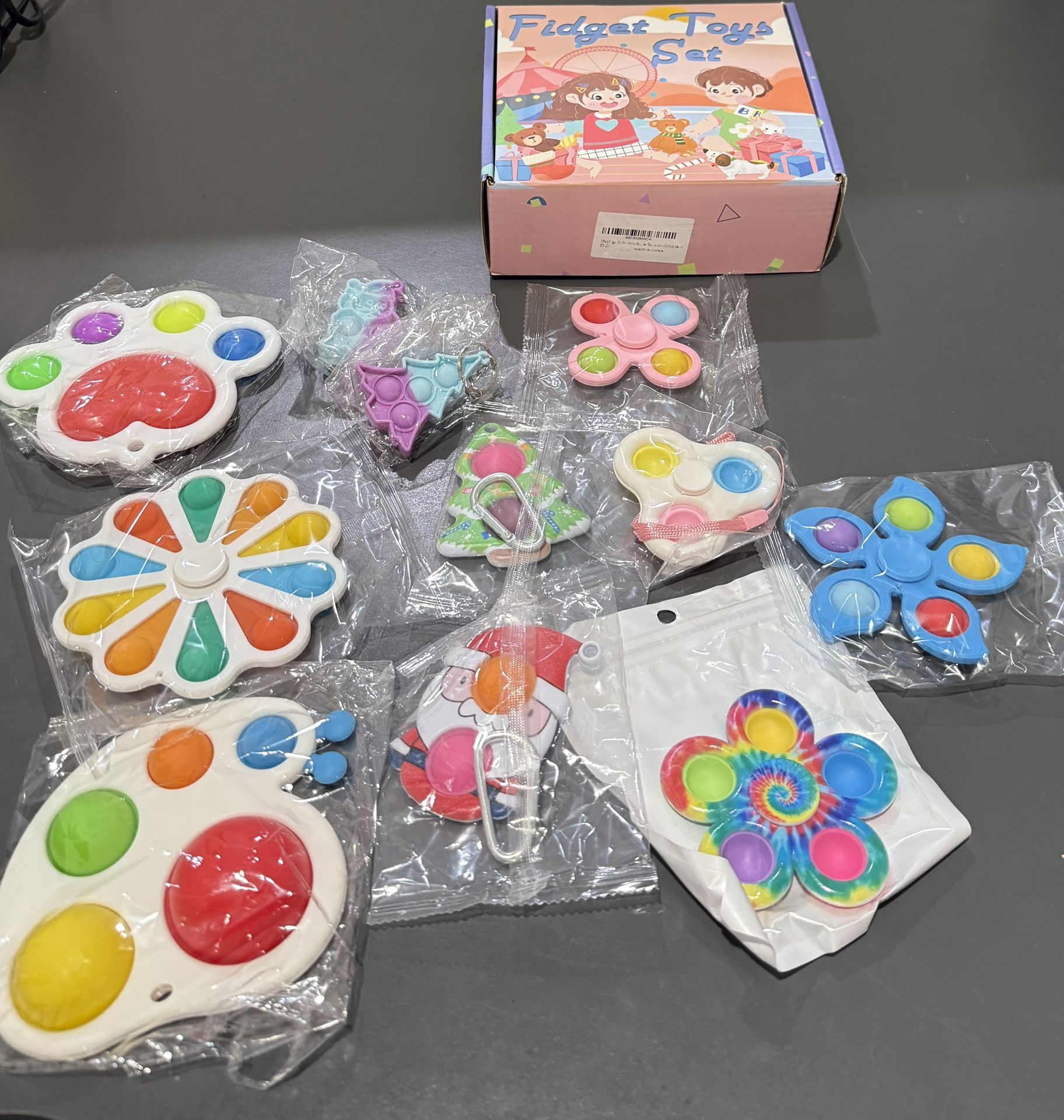 Brand new 11 PCS Christmas Sensory Fidget Toy Set – Push Bubble Pop Fidget Toys for Kids and Adults (Multicolor) Material: Non-toxic Silicone & ABS P