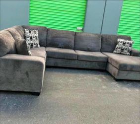 Comfortable Living Room Sectional with Ottoman