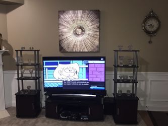 Contemporary 3 Piece Entertainment center in great condition. No TV or other stuff are included. It is three peice nice entertainment center only. Th