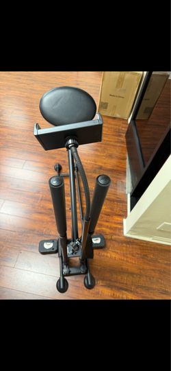 Squat machine with telephone holder