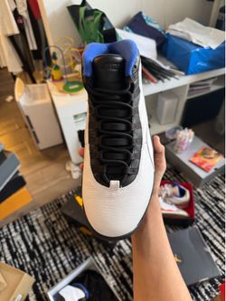 Nike Air Jordan 10 Retro Orlando sneakers in white, black, and royal blue leather.