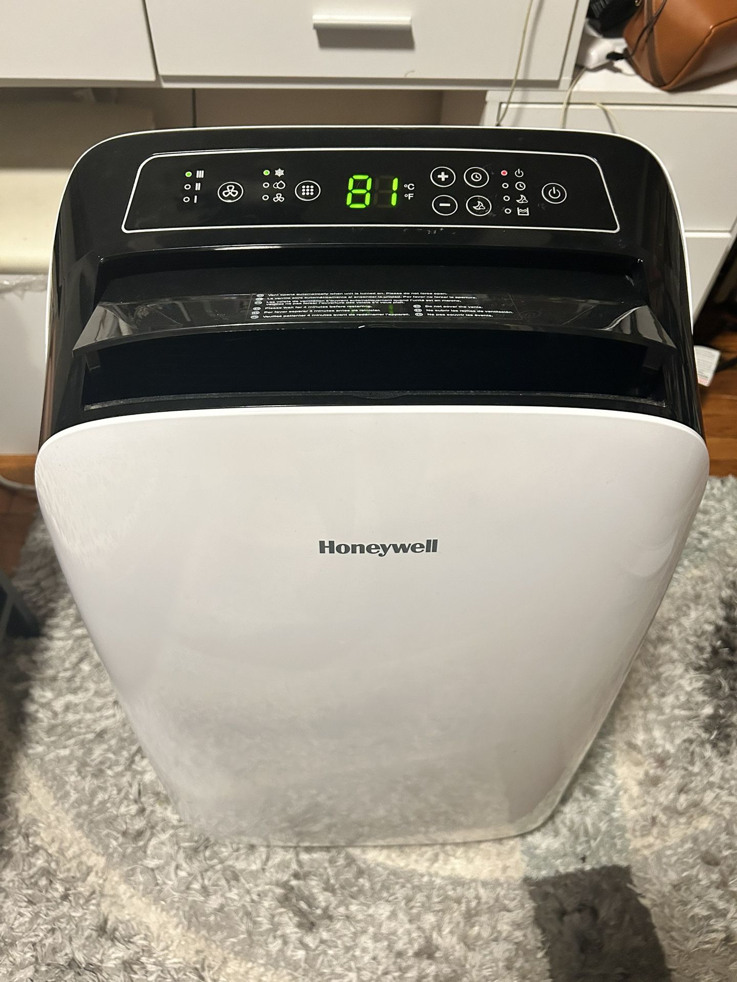 Honeywell HL14CESWK Portable Air Conditioner, 14,000 BTU Cooling, with Dehumidifier and Remote (White-Black)