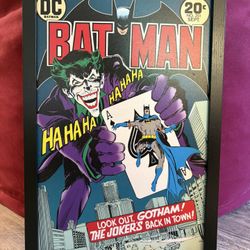 Framed Batman Joker’s Back In Town Board Print
