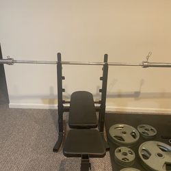 Weider Bar, Bench, and  weights 